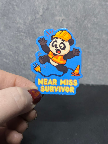 Near Miss Survivor - LDC - Bulk Pack of 16 Stickers - Apx 2in - Water Resistant Stickers