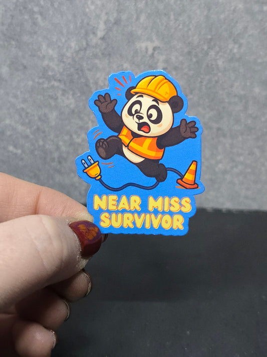 Near Miss Survivor - LDC - Bulk Pack of 16 Stickers - Apx 2in - Water Resistant Stickers