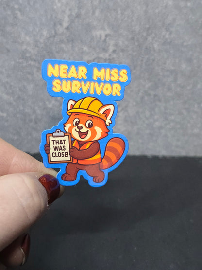 Near Miss Survivor - LDC - Bulk Pack of 16 Stickers - Apx 2in - Water Resistant Stickers